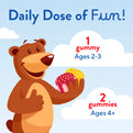 Cartoon bear with red and yellow gummies, text 'Daily Dose of Fun!', '1 gummy Ages 2-3', '2 gummies Ages 4+'.